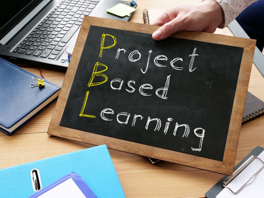 “Project-based learning” is written on a chalkboard.