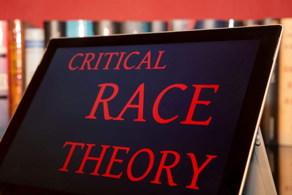 A close-up of an iPad displaying the phrase “critical race theory.”